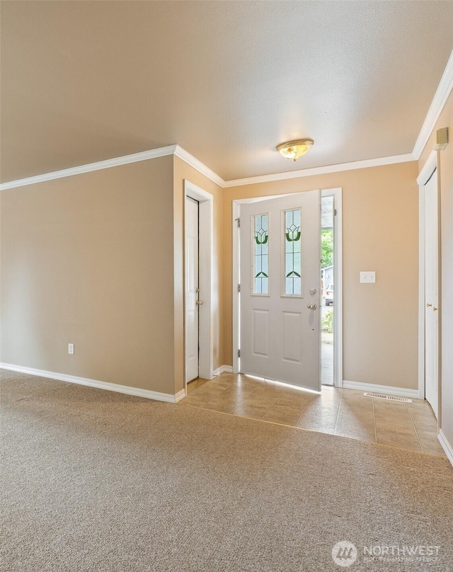 352 E Springfield Loop, Shelton, WA 98584 - entrance foyer with ornamental molding, light carpet, and light tile patterned floors