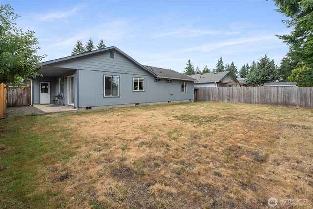 352 E Springfield Loop, Shelton, WA 98584 - rear view of house featuring a fenced backyard and crawl space