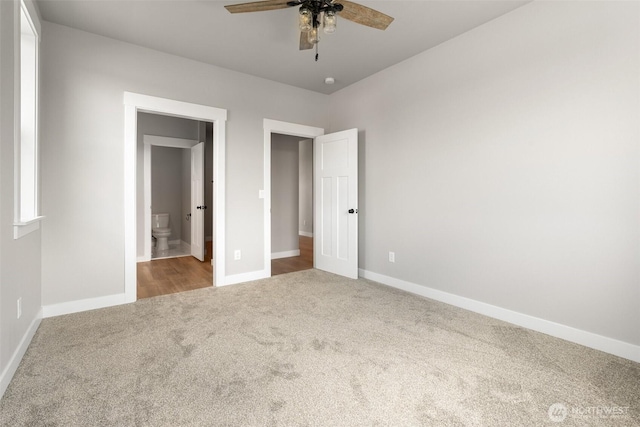 253 Kakela Rd, Winlock, WA 98596 - unfurnished bedroom with carpet, ensuite bath, and ceiling fan