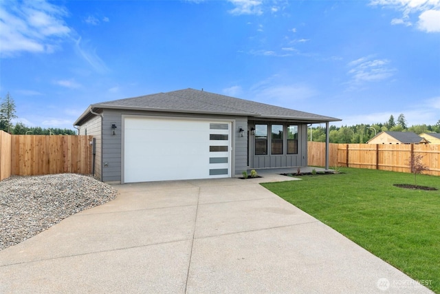 253 Kakela Rd, Winlock, WA 98596 - view of front facade with driveway, an attached garage, board and batten siding, and a shingled roof
