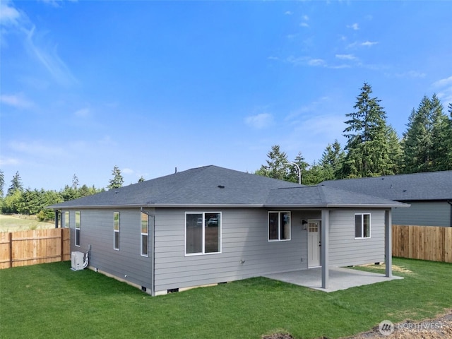 253 Kakela Rd, Winlock, WA 98596 - rear view of property featuring a patio area and a shingled roof