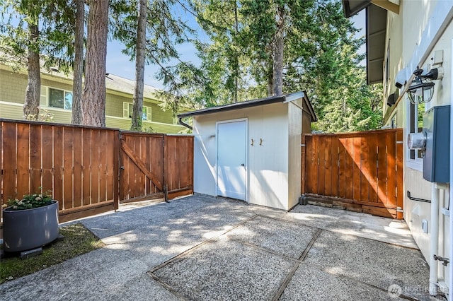 1717 150th Ave SE Unit 18, Bellevue, WA 98007 - view of shed with a gate