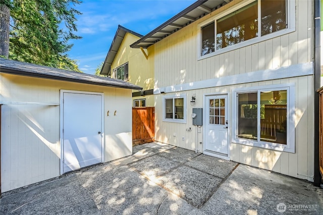 1717 150th Ave SE Unit 18, Bellevue, WA 98007 - rear view of house with a patio area and an outbuilding