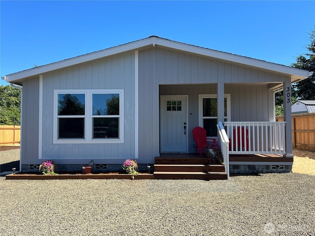 303 N Wynoochee Dr SW, Ocean Shores, WA 98569 - view of front of house featuring a porch