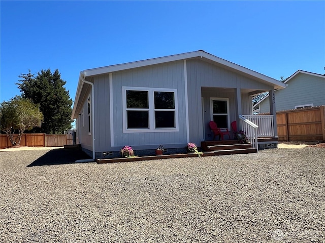 303 N Wynoochee Dr SW, Ocean Shores, WA 98569 - view of front of house with a porch and crawl space