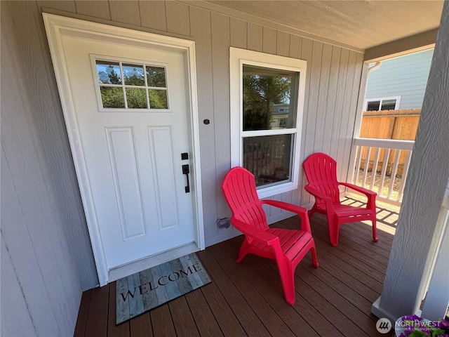 303 N Wynoochee Dr SW, Ocean Shores, WA 98569 - doorway to property with a porch