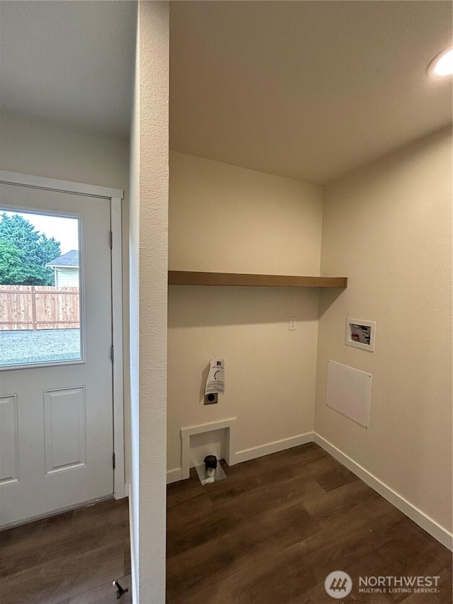 303 N Wynoochee Dr SW, Ocean Shores, WA 98569 - washroom with hookup for a washing machine and dark wood-style floors