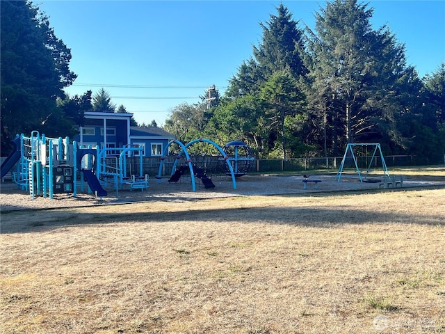 303 N Wynoochee Dr SW, Ocean Shores, WA 98569 - communal playground featuring a yard