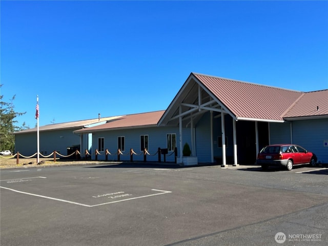 303 N Wynoochee Dr SW, Ocean Shores, WA 98569 - view of building exterior featuring uncovered parking