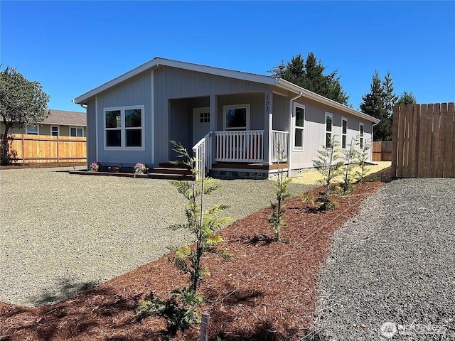 303 N Wynoochee Dr SW, Ocean Shores, WA 98569 - manufactured / mobile home featuring covered porch