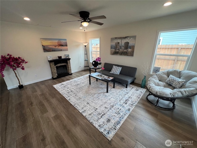 303 N Wynoochee Dr SW, Ocean Shores, WA 98569 - living area with plenty of natural light, dark wood-type flooring, ceiling fan, recessed lighting, and a fireplace