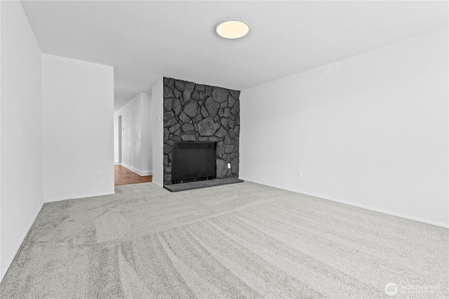 2235 E Wright Ave, Tacoma, WA 98404 - unfurnished living room with a fireplace and carpet flooring