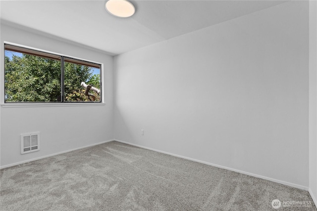 2235 E Wright Ave, Tacoma, WA 98404 - carpeted spare room featuring baseboards
