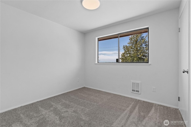 2235 E Wright Ave, Tacoma, WA 98404 - carpeted spare room featuring baseboards