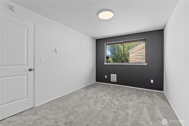 2235 E Wright Ave, Tacoma, WA 98404 - spare room featuring carpet and a smoke detector