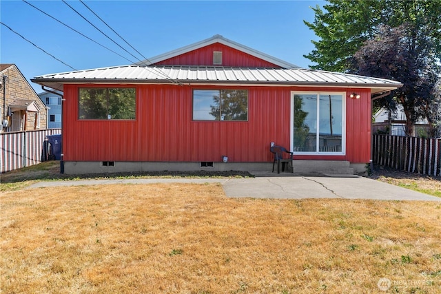 2235 E Wright Ave, Tacoma, WA 98404 - view of side of home with a metal roof, a patio, and crawl space