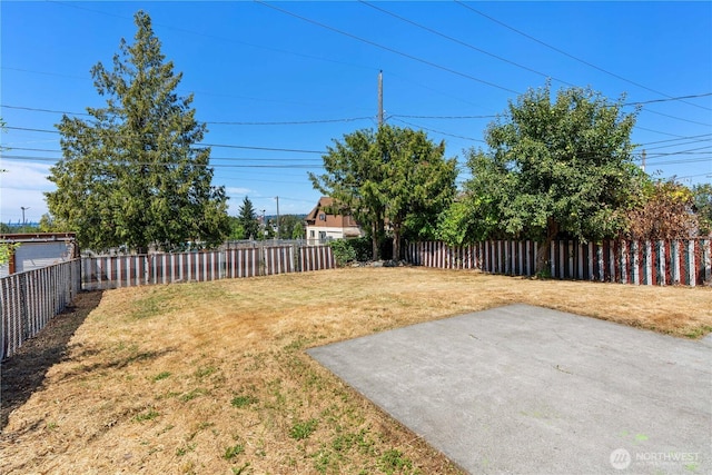 2235 E Wright Ave, Tacoma, WA 98404 - fenced backyard with a patio area