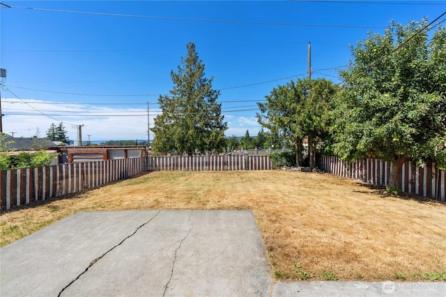 2235 E Wright Ave, Tacoma, WA 98404 - fenced backyard with a patio