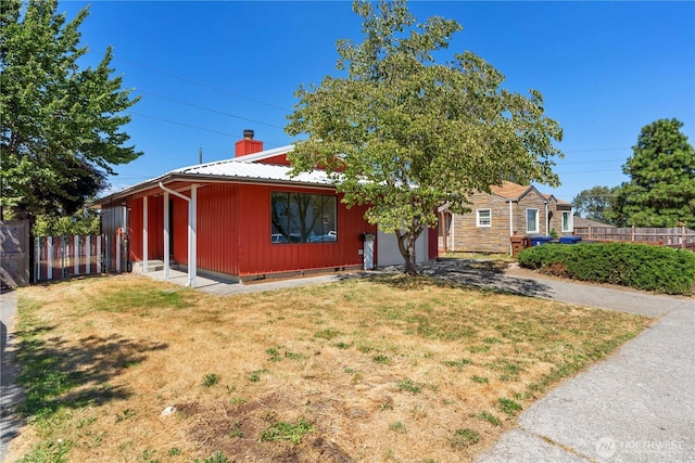 2235 E Wright Ave, Tacoma, WA 98404 - view of front facade featuring a chimney and an attached garage