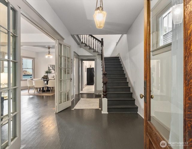743 Broadway E, Seattle, WA 98102 - entryway featuring french doors, stairway, and wood-type flooring
