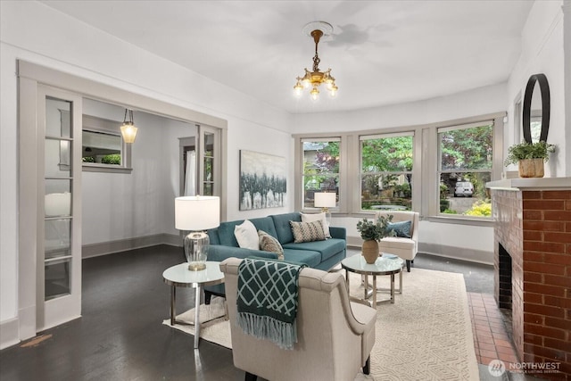743 Broadway E, Seattle, WA 98102 - living area with a brick fireplace and a chandelier