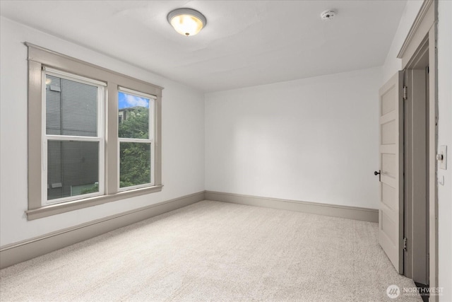 743 Broadway E, Seattle, WA 98102 - unfurnished room with carpet flooring and a smoke detector