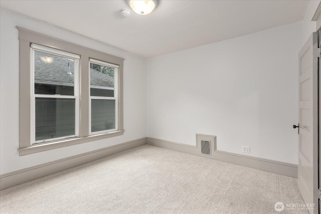 743 Broadway E, Seattle, WA 98102 - spare room featuring a smoke detector and carpet floors