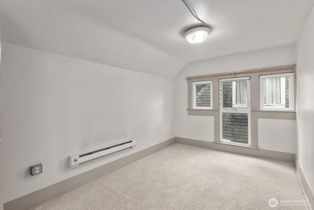 743 Broadway E, Seattle, WA 98102 - bonus room featuring baseboard heating, vaulted ceiling, carpet flooring, and plenty of natural light