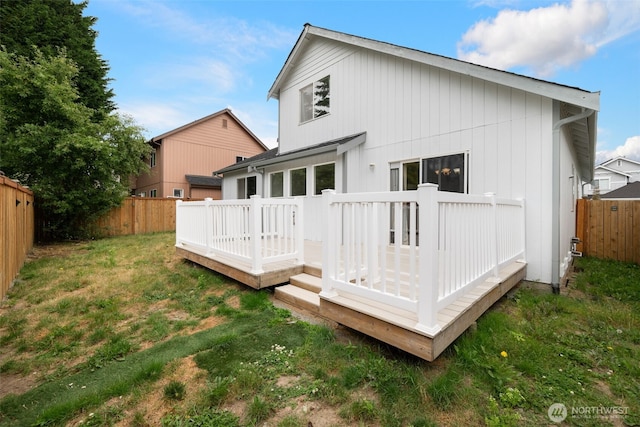 20122 102nd Ave SE, Kent, WA 98031 - rear view of house with a fenced backyard and a wooden deck