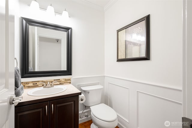 20122 102nd Ave SE, Kent, WA 98031 - bathroom with crown molding, vanity, a wainscoted wall, and a decorative wall