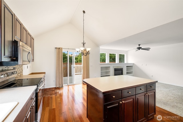 20122 102nd Ave SE, Kent, WA 98031 - kitchen featuring stainless steel appliances, backsplash, a ceiling fan, a chandelier, and light countertops