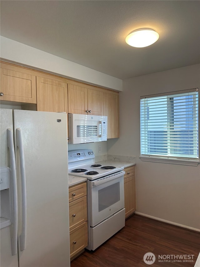 10511 Midvale Ave N Unit 202, Seattle, WA 98133 - kitchen featuring white appliances, light countertops, light brown cabinetry, and dark wood finished floors