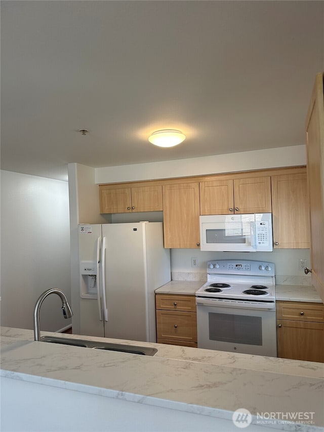 10511 Midvale Ave N Unit 202, Seattle, WA 98133 - kitchen with white appliances and light stone counters