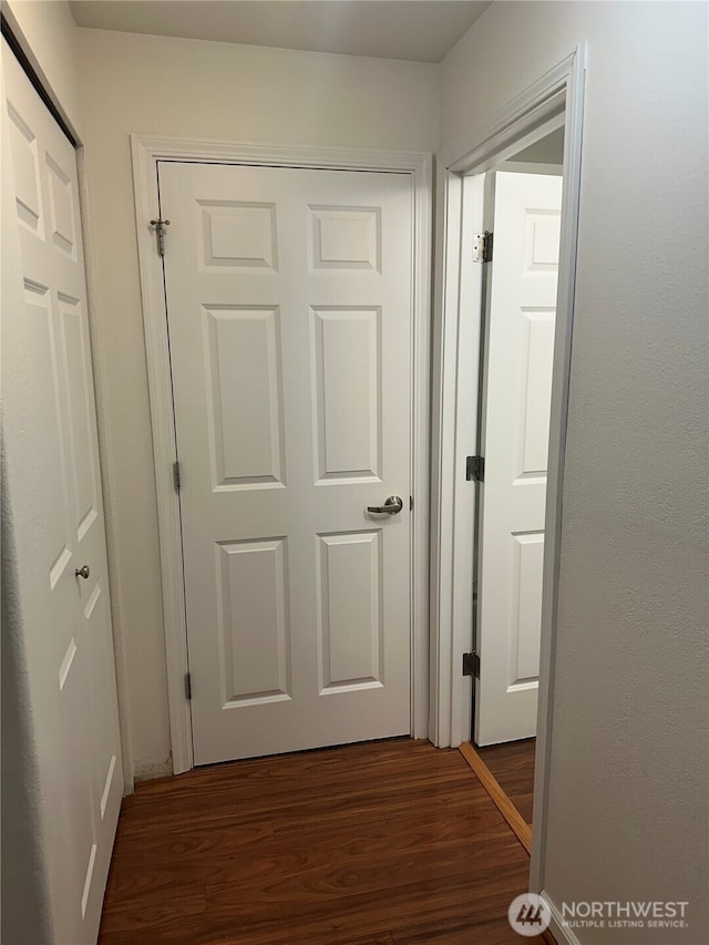 10511 Midvale Ave N Unit 202, Seattle, WA 98133 - hallway with dark wood-style floors