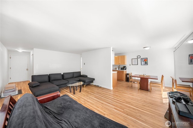 11556 Greenwood Ave N Unit 105, Seattle, WA 98133 - living area featuring light wood finished floors