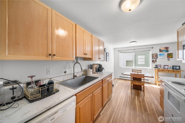 11556 Greenwood Ave N Unit 105, Seattle, WA 98133 - kitchen featuring white appliances, light wood-style floors, light brown cabinetry, and a baseboard heating unit