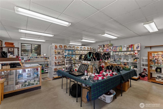 2434 NW Alan Ave, East Wenatchee, WA 98802 - misc room featuring a workshop area, concrete floors, and a paneled ceiling