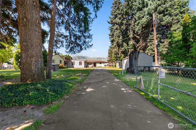 2434 NW Alan Ave, East Wenatchee, WA 98802 - view of asphalt driveway featuring a gated entry