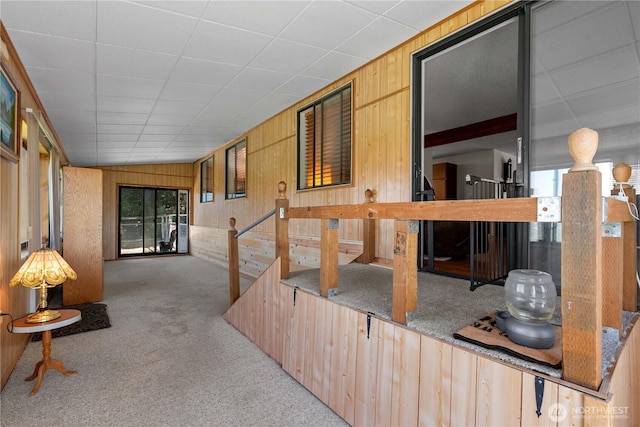 2434 NW Alan Ave, East Wenatchee, WA 98802 - interior space featuring carpet flooring and wooden walls
