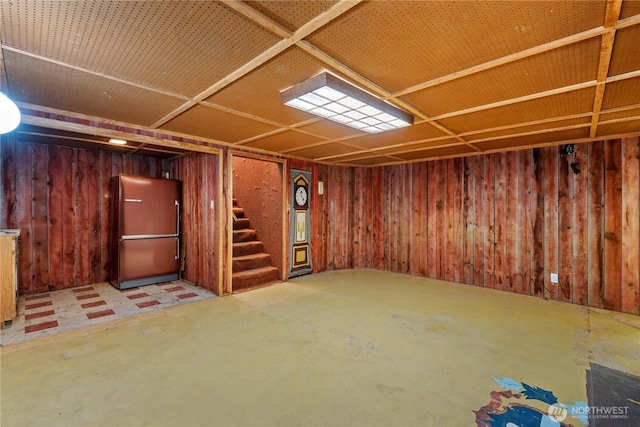 2434 NW Alan Ave, East Wenatchee, WA 98802 - finished below grade area featuring fridge, stairs, and wooden walls