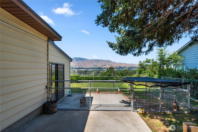 2434 NW Alan Ave, East Wenatchee, WA 98802 - view of patio featuring a mountain view and a gate