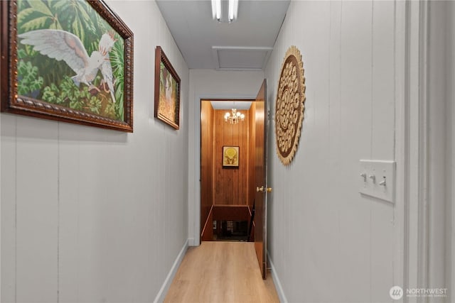 2434 NW Alan Ave, East Wenatchee, WA 98802 - hall featuring light wood-type flooring and a chandelier