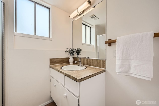 3226 29th Ave W, Seattle, WA 98199 - full bathroom with vanity and a shower with shower door