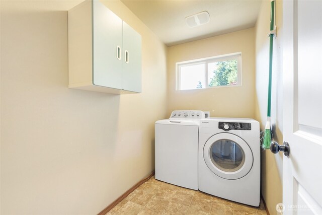 502 182nd St E, Spanaway, WA 98387 - washroom featuring cabinet space and washing machine and dryer