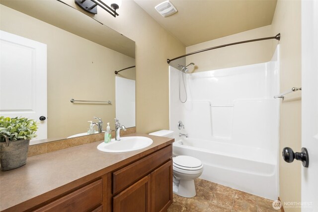 502 182nd St E, Spanaway, WA 98387 - bathroom featuring vanity and tub / shower combination