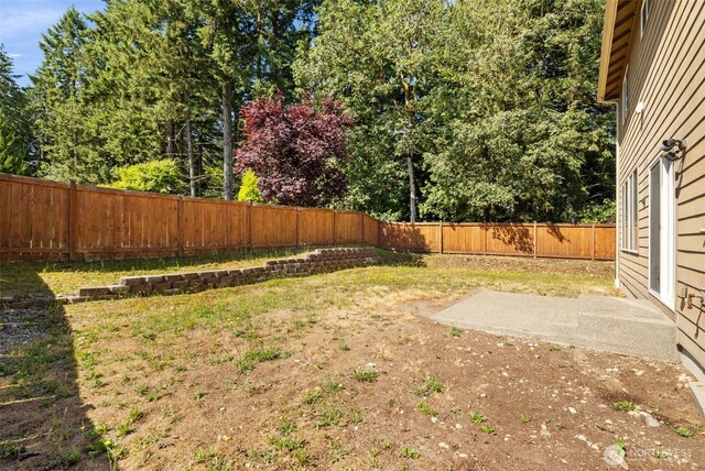 502 182nd St E, Spanaway, WA 98387 - fenced backyard featuring a patio
