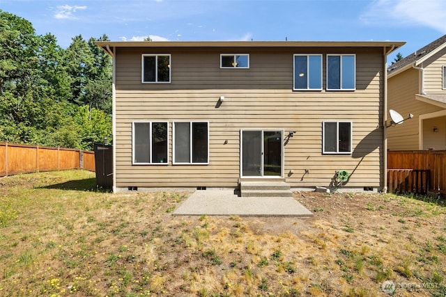 502 182nd St E, Spanaway, WA 98387 - back of property featuring a fenced backyard, crawl space, and a patio area