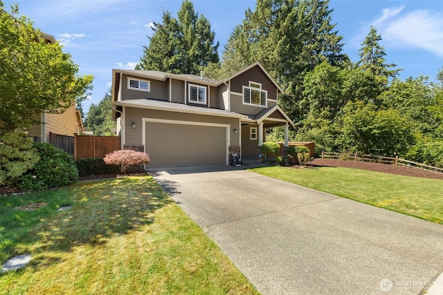 502 182nd St E, Spanaway, WA 98387 - view of front of house featuring concrete driveway and a garage