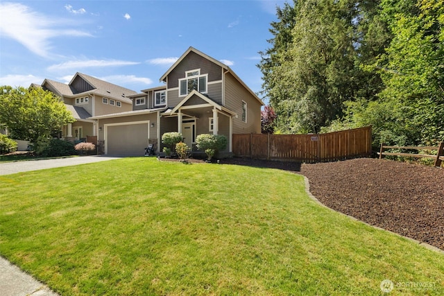 502 182nd St E, Spanaway, WA 98387 - view of front of house featuring concrete driveway and a garage