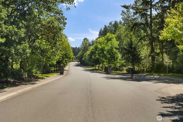 502 182nd St E, Spanaway, WA 98387 - view of asphalt street featuring curbs
